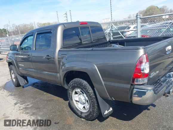 2009 Toyota Tacoma with VIN 3TMLU42N19M024223, listed as a IAAI auction lot 41833027 with 182,206 mi miles and . Bid and sale history available at DreamBid. Image 14.