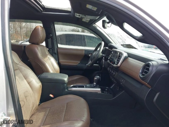 2019 Toyota Tacoma 4WD SR with VIN 3TMGZ5AN7KM287140, listed as a IAAI auction lot 41541937 with 41,843 mi miles. Bid and sale history available at carsss.com. Image 5.