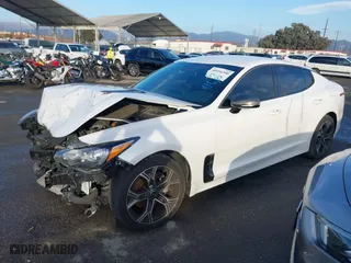 2021 Kia Stinger GT-Line with VIN KNAE15LAXM6091993, listed as a IAAI auction lot 40996390 with 58,257 mi miles. Bid and sale history available at carsss.com. Image 18.