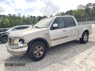 2002 Ford F-150 XLT with VIN 1FTRW07L12KA11845, listed as a Copart auction lot 51987205 with 282,865 mi miles and Salvage Title. Bid and sale history available at carsss.com. Image 1.