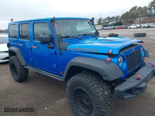 2016 Jeep Wrangler Unlimited Rubicon with VIN 1C4BJWFG2GL192074, listed as a IAAI auction lot 41598861 with 70,000 mi miles. Bid and sale history available at carsss.com. Image 13.