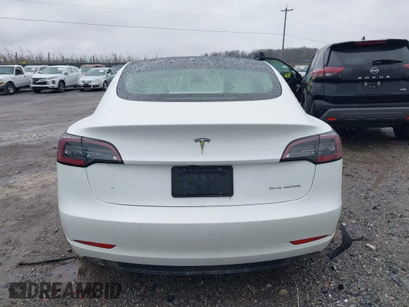 2022 Tesla Model 3 Long Range with VIN 5YJ3E1EB0NF129945, listed as a IAAI auction lot 41965531 with 59,162 mi miles and . Bid and sale history available at DreamBid. Image 16.