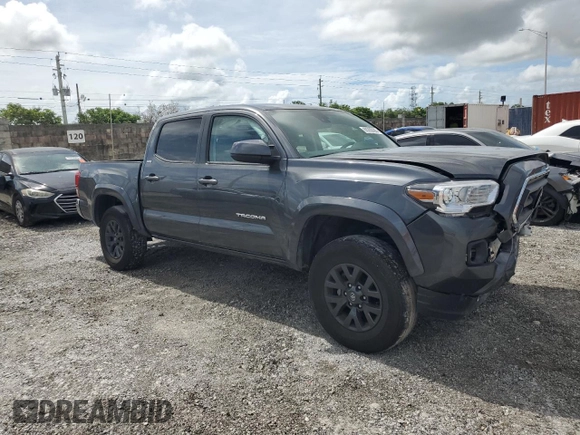2023 Toyota Tacoma SR with VIN 3TMCZ5AN6PM571686, listed as a Copart auction lot 60260095 with 29,687 mi miles and Non repairable. Bid and sale history available at DreamBid. Image 4.