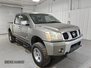2006 Nissan Titan LE z VIN 1N6AA07BX6N573134, wystawiony jako Copart lot #46487815 z przebiegiem 161 174 mil mil oraz Czysty tytuł • Clean title. Historia ofert i sprzedaży dostępna na DreamBid. Obrazek 4.