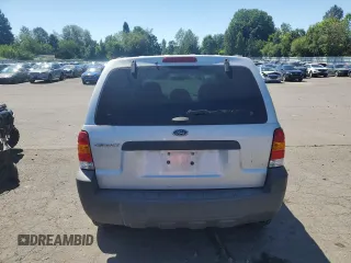 2005 Ford Escape XLS Value with VIN 1FMYU92Z55KC93604, listed as a Copart auction lot 60104145 with 86,788 mi miles and Salvage title. Bid and sale history available at DreamBid. Image 6.