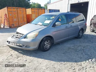 2007 Honda Odyssey EX-L z VIN 5FNRL38757B055931, wystawiony jako IAAI lot #42240198 z przebiegiem 186 954 mil mil oraz . Historia ofert i sprzedaży dostępna na DreamBid. Obrazek 2.