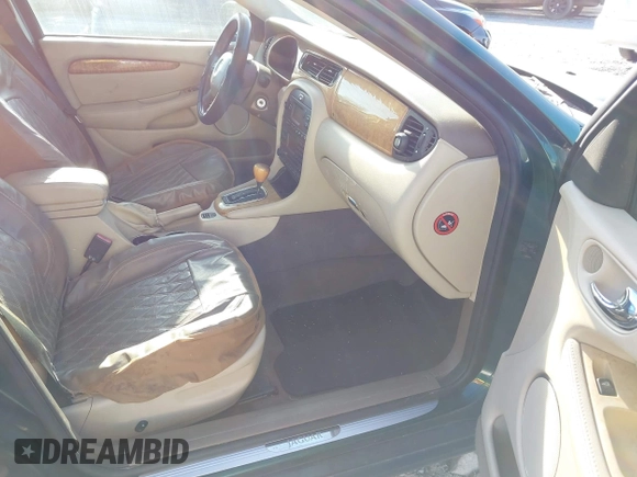 2006 Jaguar X-Type with VIN SAJWA51A46WE99813, listed as a IAAI auction lot 42011197 with 215,839 mi miles and . Bid and sale history available at DreamBid. Image 5.