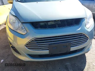 2013 Ford C-Max SEL z VIN 1FADP5BU2DL502027, wystawiony jako IAAI lot #41839015 z przebiegiem 125 981 mil mil oraz . Historia ofert i sprzedaży dostępna na DreamBid. Obrazek 6.