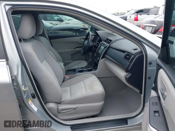 2015 Toyota Camry XLE with VIN 4T4BF1FKXFR472201, listed as a IAAI auction lot 41883944 with 143,296 mi miles and . Bid and sale history available at DreamBid. Image 5.
