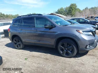 2021 Honda Passport Elite with VIN 5FNYF8H08MB011467, listed as a IAAI auction lot 41929708 with 34,106 mi miles. Bid and sale history available at carsss.com. Image 13.