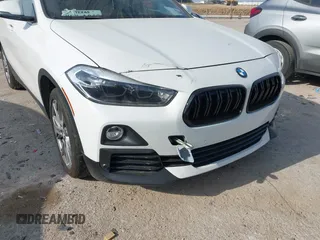 2020 BMW X2 sDrive28i with VIN WBXYH9C07L5P35810, listed as a IAAI auction lot 42043222 with 101,329 mi miles and . Bid and sale history available at DreamBid. Image 6.