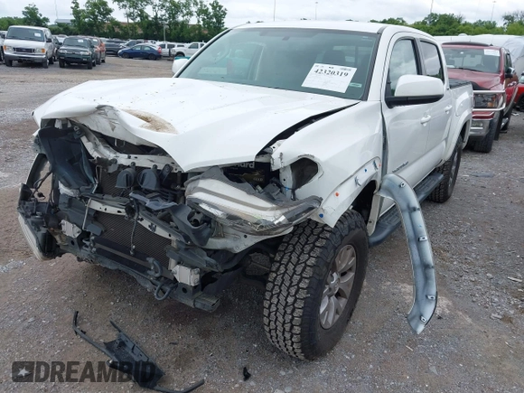 2017 Toyota Tacoma SR5 z VIN 3TMAZ5CN8HM051558, wystawiony jako IAAI lot #42320319 z przebiegiem 101 767 mil mil oraz . Historia ofert i sprzedaży dostępna na DreamBid. Obrazek 2.
