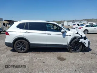 2023 Volkswagen Tiguan SE with VIN 3VVMB7AX4PM128427, listed as a IAAI auction lot 42054477 with 29,731 mi miles and . Bid and sale history available at DreamBid. Image 12.