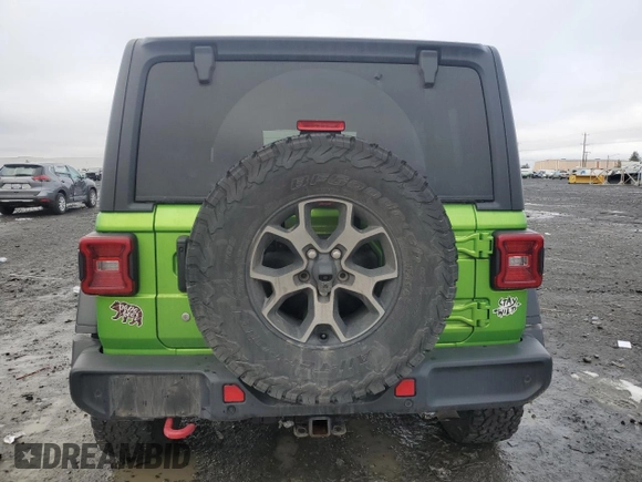 2019 Jeep Wrangler Unlimited Rubicon with VIN 1C4HJXFN8KW545049, listed as a Copart auction lot 41445415 with 57,744 mi miles and Salvage title. Bid and sale history available at DreamBid. Image 6.
