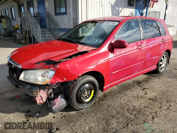 2005 Kia Spectra with VIN KNAFE162255129620, listed as a Copart auction lot 86822464 with 249,516 mi miles and Salvage Title. Bid and sale history available at carsss.com. Image 1.
