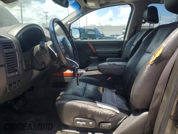 2006 Infiniti QX56 z VIN 5N3AA08A26N807620, wystawiony jako Copart lot #66207424 z przebiegiem 186 381 mil mil oraz Czysty tytuł • Clean title. Historia ofert i sprzedaży dostępna na DreamBid. Obrazek 7.