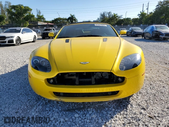 2009 Aston Martin Vantage z VIN SCFBF04C79GD12188, wystawiony jako Copart lot #45348405 z przebiegiem 29 580 mil mil oraz Szkoda całkowita • Salvage title. Historia ofert i sprzedaży dostępna na DreamBid. Obrazek 5.