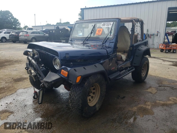 2000 Jeep Wrangler Sport with VIN 1J4FA49S0YP770943, listed as a Copart auction lot 68615524 with 165,377 mi miles and Salvage Title. Bid and sale history available at carsss.com. Image 1.