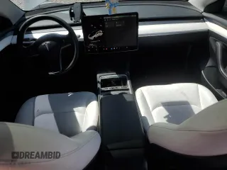 2023 Tesla Model 3 with VIN 5YJ3E1EA3PF602067, listed as a Copart auction lot 52317695 with 54,867 mi miles and Salvage Title. Bid and sale history available at DreamBid. Image 8.