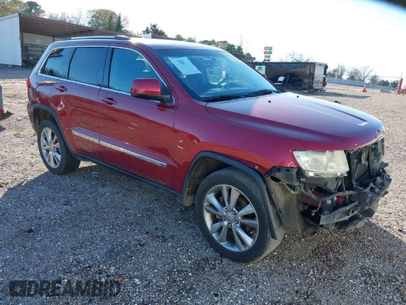 2013 Jeep Grand Cherokee Laredo with VIN 1C4RJEAG6DC636780, listed as a IAAI auction lot 41127701 with 135,026 mi miles. Bid and sale history available at carsss.com. Image 1.