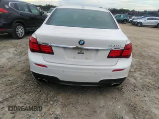 2015 BMW 7 Series 750Li with VIN WBAYE8C50FD781160, listed as a IAAI auction lot 41061232 with 154,496 mi miles. Bid and sale history available at carsss.com. Image 16.
