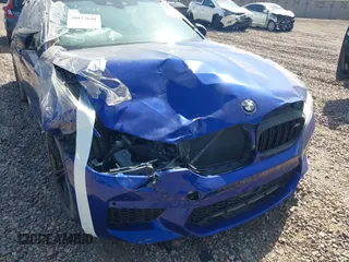2018 BMW M5 z VIN WBSJF0C53JB282658, wystawiony jako IAAI lot #39977648 z przebiegiem 28 001 mil mil oraz . Historia ofert i sprzedaży dostępna na DreamBid. Obrazek 6.