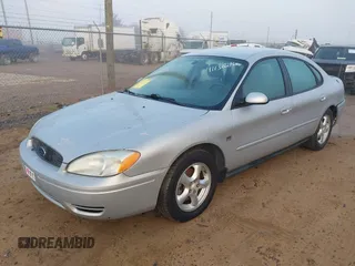 2004 Ford Taurus SES z VIN 1FAHP55S34G131304, wystawiony jako IAAI lot #41130286 z przebiegiem 112 404 mil mil oraz . Historia ofert i sprzedaży dostępna na DreamBid. Obrazek 2.