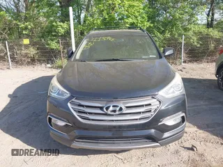 2017 Hyundai Santa Fe 2.4L z VIN 5NMZU3LB2HH037704, wystawiony jako IAAI lot #42113964 z przebiegiem 125 488 mil mil oraz . Historia ofert i sprzedaży dostępna na DreamBid. Obrazek 12.