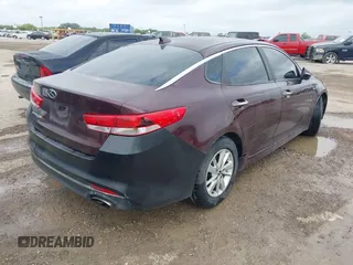 2016 Kia Optima LX with VIN 5XXGT4L3XGG027430, listed as a IAAI auction lot 41940146 with 75,456 mi miles and . Bid and sale history available at carsss.com. Image 4.