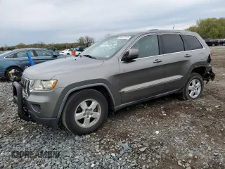 2011 Jeep Grand Cherokee Laredo with VIN 1J4RR4GG7BC578129, listed as a Copart auction lot 53147775 with 157,127 mi miles and Salvage title. Bid and sale history available at DreamBid. Image 1.