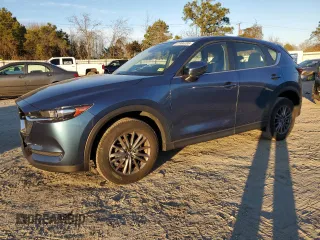 2021 Mazda CX-5 Sport with VIN JM3KFABMXM1313156, listed as a Copart auction lot 41365285 with 42,828 mi miles and Salvage Title. Bid and sale history available at carsss.com. Image 1.