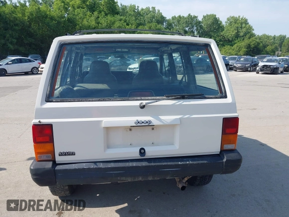 1996 Jeep Cherokee Sport z VIN 1J4FJ68S3TL226188, wystawiony jako IAAI lot #42460538 z przebiegiem 217 118 mil mil oraz . Historia ofert i sprzedaży dostępna na DreamBid. Obrazek 16.