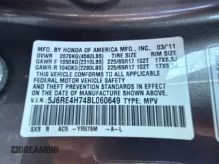2011 Honda CR-V EX-L z VIN 5J6RE4H74BL060649, wystawiony jako Copart lot #61692905 z przebiegiem 183 943 mil mil oraz Czysty tytuł • Clean title. Historia ofert i sprzedaży dostępna na DreamBid. Obrazek 10.