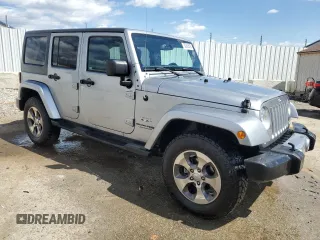 2018 Jeep Wrangler JK Unlimited Sahara with VIN 1C4HJWEG8JL921696, listed as a Copart auction lot 50803695 with 115,729 mi miles and Salvage Title. Bid and sale history available at carsss.com. Image 4.