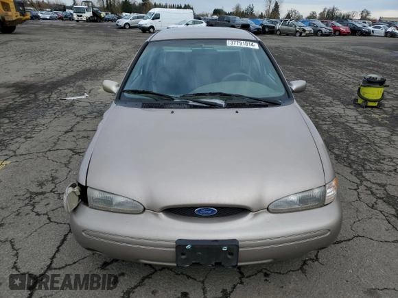 1996 Ford Contour with VIN 3FALP6535TM129390, listed as a Copart auction lot 73338064 with 87,588 mi miles and Salvage title. Bid and sale history available at DreamBid. Image 5.