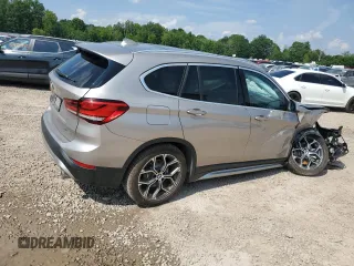 2021 BMW X1 xDrive28i with VIN WBXJG9C09M5S52289, listed as a Copart auction lot 64413105 with Not provided miles and Salvage title. Bid and sale history available at DreamBid. Image 3.