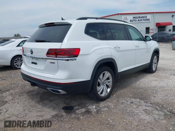 2021 Volkswagen Atlas SE with VIN 1V2HR2CA7MC556625, listed as a IAAI auction lot 42401730 with 75,261 mi miles and . Bid and sale history available at DreamBid. Image 4.