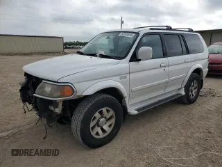 2000 Mitsubishi Montero z VIN JA4MT41R1YP044776, wystawiony jako Copart lot #53791615 z przebiegiem 242 626 mil mil oraz Szkody całkowita. Historia ofert i sprzedaży dostępna na DreamBid. Obrazek 1.