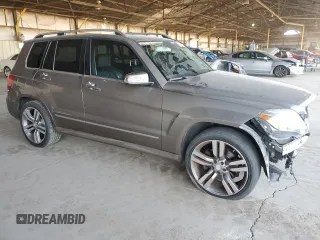 2014 Mercedes-Benz GLK 350 with VIN WDCGG8JB7EG251079, listed as a Copart auction lot 74130584 with 100,252 mi miles and Salvage Title. Bid and sale history available at DreamBid. Image 4.
