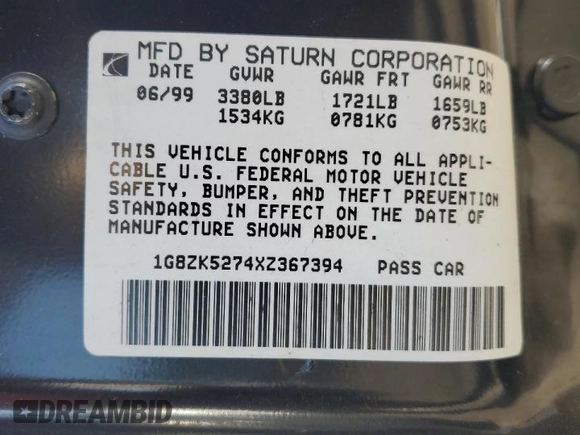 1999 Saturn SL with VIN 1G8ZK5274XZ367394, listed as a Copart auction lot 63863795 with 73,197 mi miles and Salvage title. Bid and sale history available at DreamBid. Image 12.