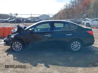2019 Nissan Sentra SV z VIN 3N1AB7APXKY326869, wystawiony jako IAAI lot #41905231 z przebiegiem 66 895 mil mil oraz . Historia ofert i sprzedaży dostępna na DreamBid. Obrazek 14.