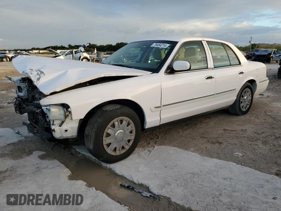 2006 Mercury Grand Marquis GS z VIN 2MEFM74V26X621309, wystawiony jako Copart lot #76454214 z przebiegiem 59 171 mil mil oraz Szkoda całkowita • Salvage title. Historia ofert i sprzedaży dostępna na DreamBid. Obrazek 1.