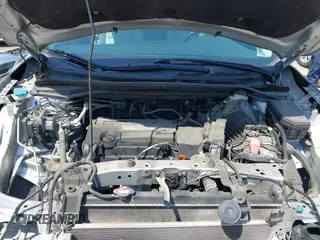 2015 Honda CR-V LX with VIN 3CZRM3H37FG706005, listed as a IAAI auction lot 41968907 with 107,690 mi miles and . Bid and sale history available at carsss.com. Image 10.