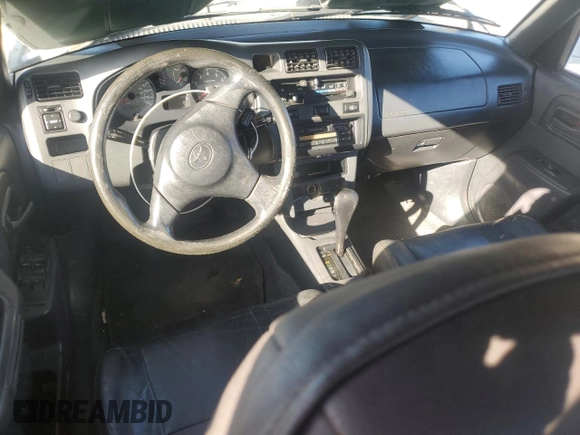 1999 Toyota RAV4 with VIN JT3GP10V7X7057488, listed as a Copart auction lot 89202915 with 391,031 mi miles and Salvage Title. Bid and sale history available at DreamBid. Image 8.