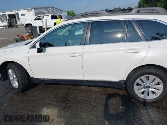 2016 Subaru Outback Premium z VIN 4S4BSBDCXG3200908, wystawiony jako IAAI lot #42411482 z przebiegiem 97 623 mil mil oraz . Historia ofert i sprzedaży dostępna na DreamBid. Obrazek 14.