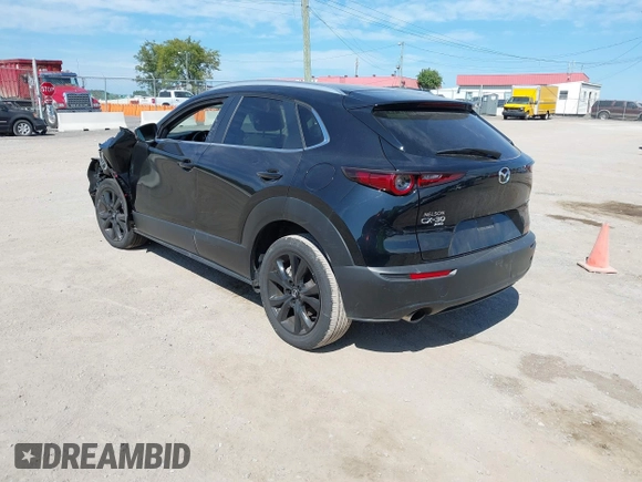 2022 Mazda CX-30 2.5 Turbo with VIN 3MVDMBAY4NM452705, listed as a IAAI auction lot 40101452 with 18,873 mi miles and . Bid and sale history available at DreamBid. Image 3.
