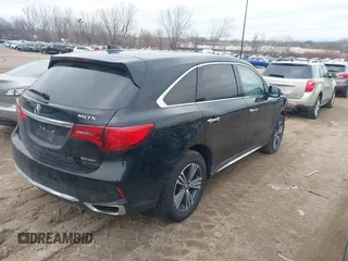 2017 Acura MDX with VIN 5FRYD4H39HB020837, listed as a IAAI auction lot 41217037 with 102,897 mi miles. Bid and sale history available at carsss.com. Image 4.