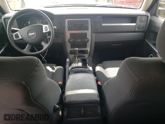 2009 Jeep Commander Sport z VIN 1J8HG48K39C554570, wystawiony jako Copart lot #52667825 z przebiegiem 194 886 mil mil oraz Szkoda całkowita • Salvage title. Historia ofert i sprzedaży dostępna na DreamBid. Obrazek 8.