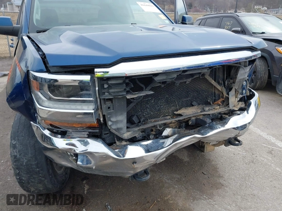2016 Chevrolet Silverado 1500 LT with VIN 3GCUKRECXGG359705, listed as a IAAI auction lot 41644633 with 157,957 mi miles and . Bid and sale history available at DreamBid. Image 6.