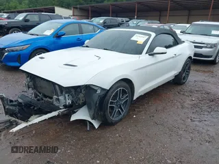 2018 Ford Mustang EcoBoost Premium z VIN 1FATP8UH9J5109820, wystawiony jako IAAI lot #42364587 z przebiegiem 118 640 mil mil oraz . Historia ofert i sprzedaży dostępna na DreamBid. Obrazek 17.